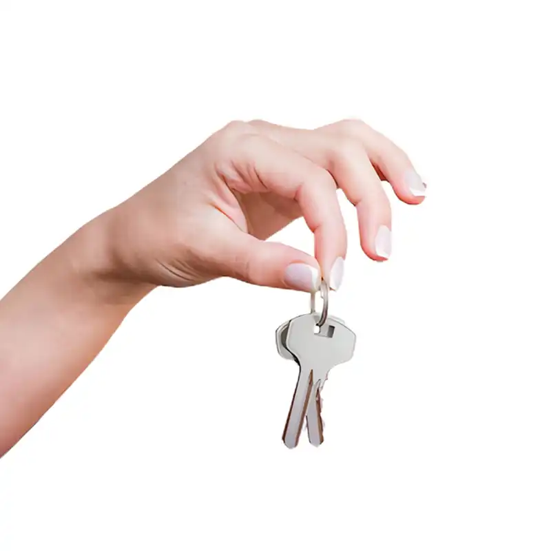 a woman's hand holding the chastity key